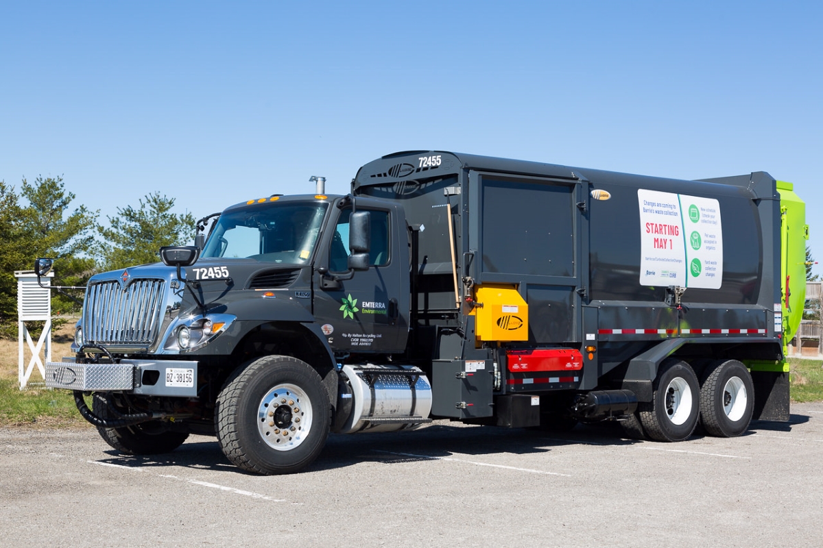 Emterra Environmental waste collection truck with Barrie waste collection change info
