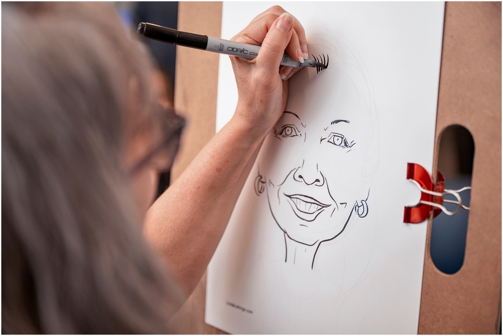 Person drawing a caricature