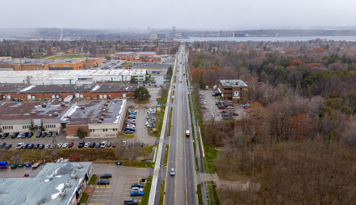 Aerial view of Bayview Drive widened to include one northbound lane, one southbound lane and a two-way left turn lane in the centre