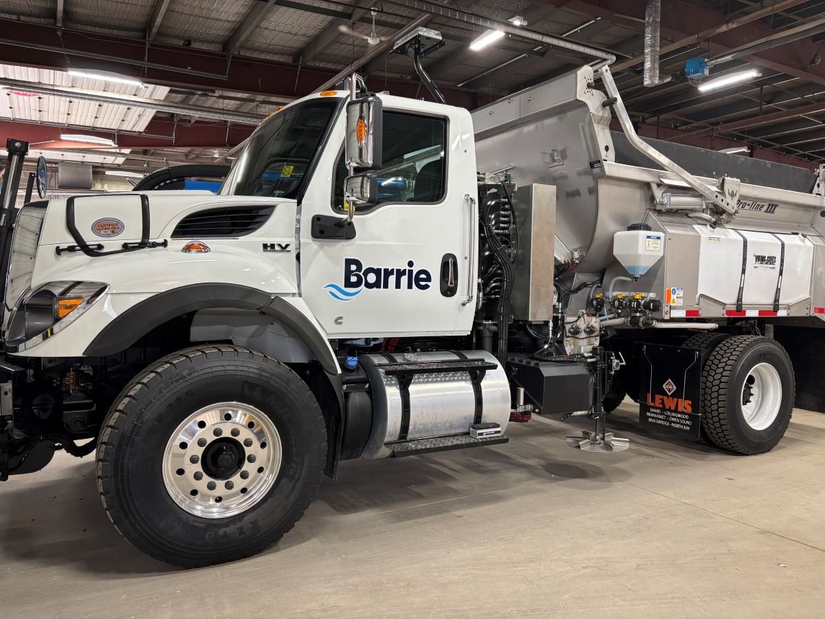City of Barrie snowplow parked in the garage
