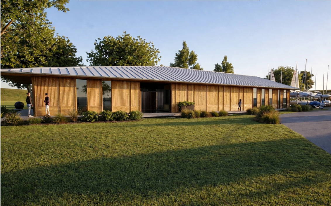 Modern wooden building, surrounded by grass and trees.