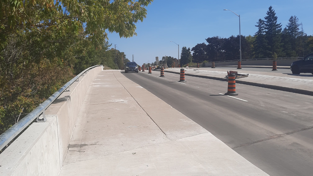 Westbound curb lane and north sidewalk open over Painswick Bridge