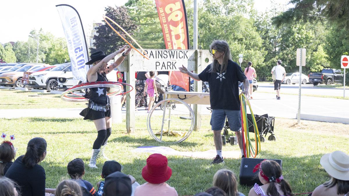 Hula hoop performance at Painswick Park