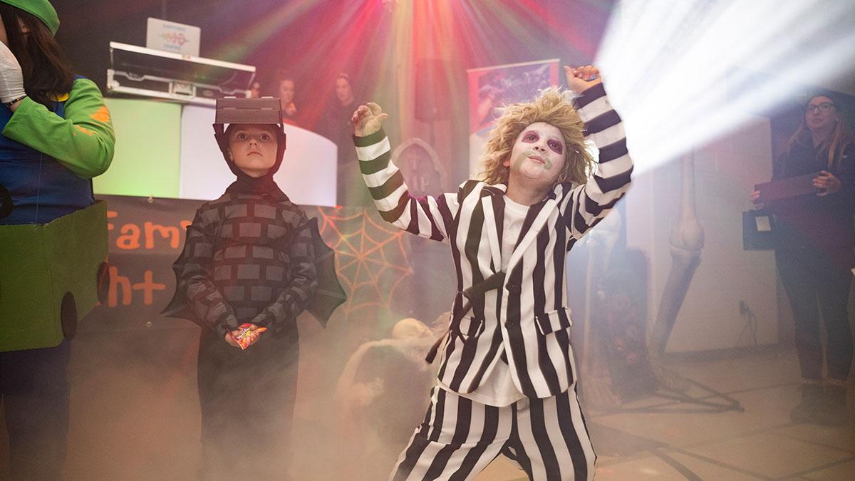 Kids dressed up in Halloween costumes