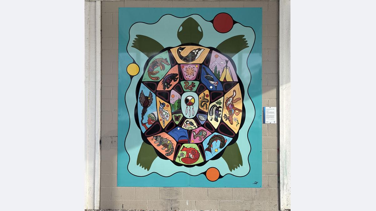 Illustration of a turtle with animals on its shell, including a deer, fox, racoon, rabbit, snake, squirrel, birds and more.