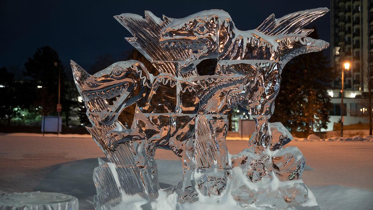 Ice carved into dinosaur sculptures