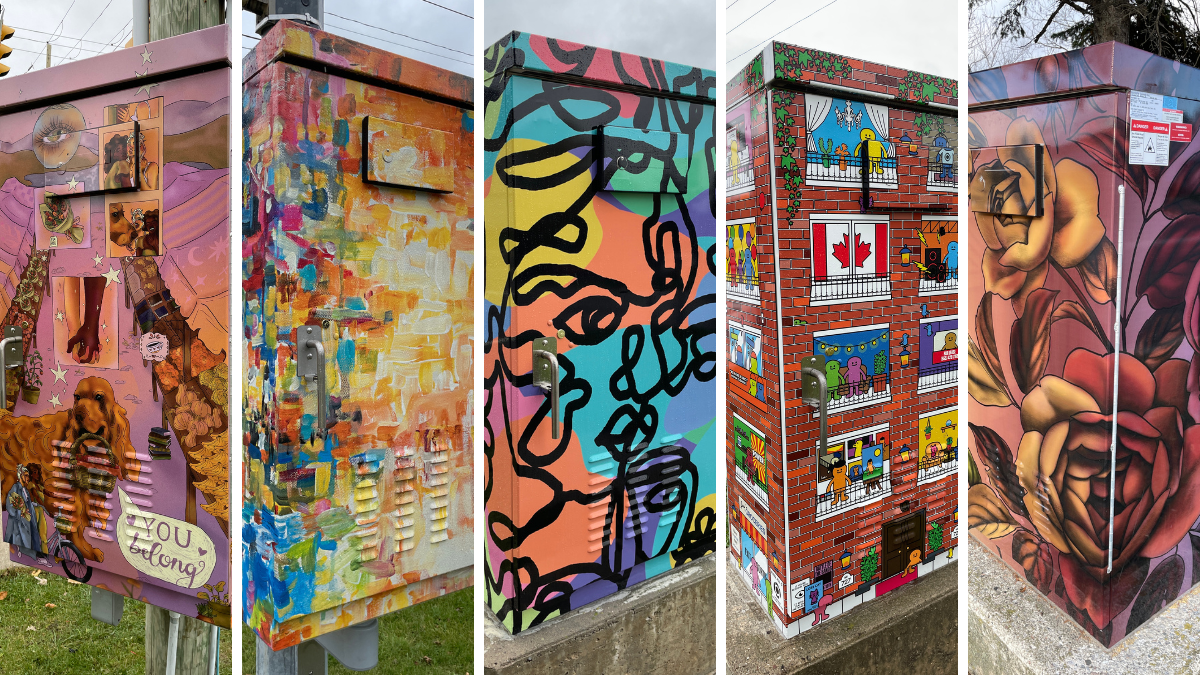 Colourful traffic cabinet boxes decorated with vibrant street art designs.