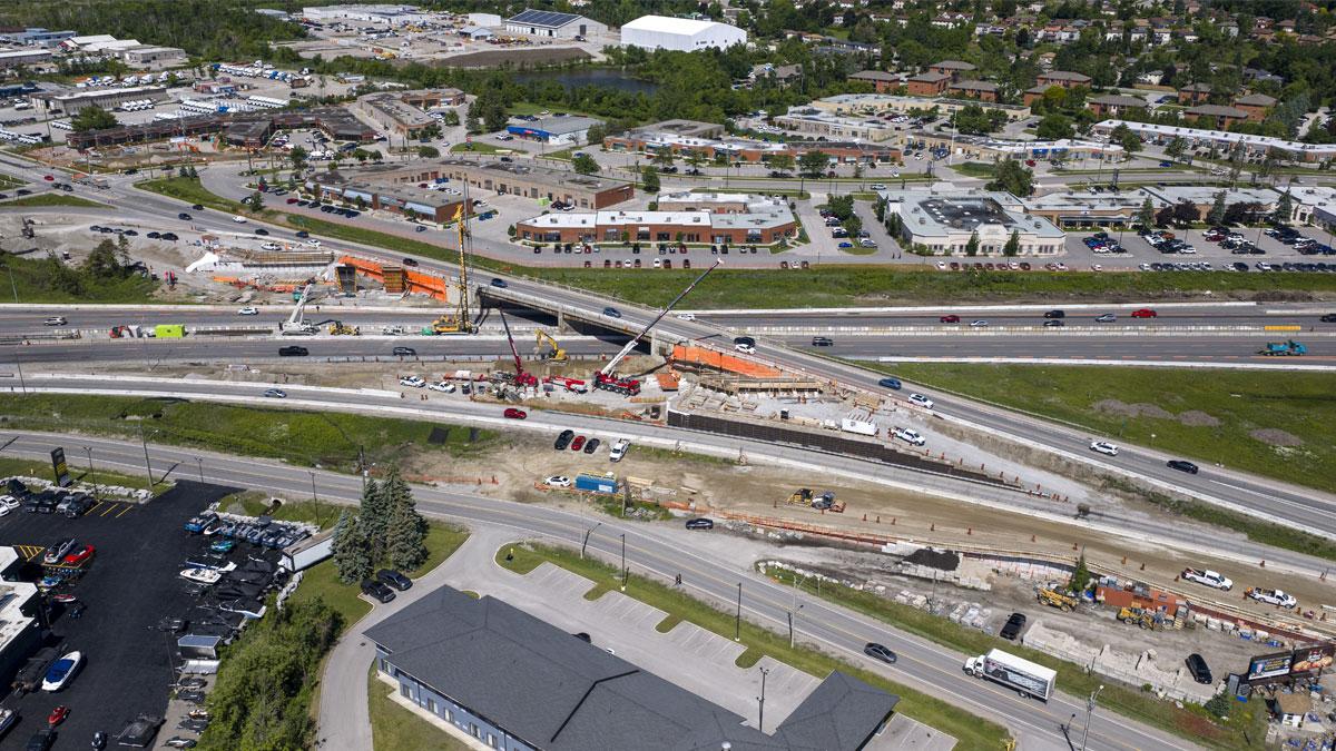 Aerial view of a highway ramp under construction.