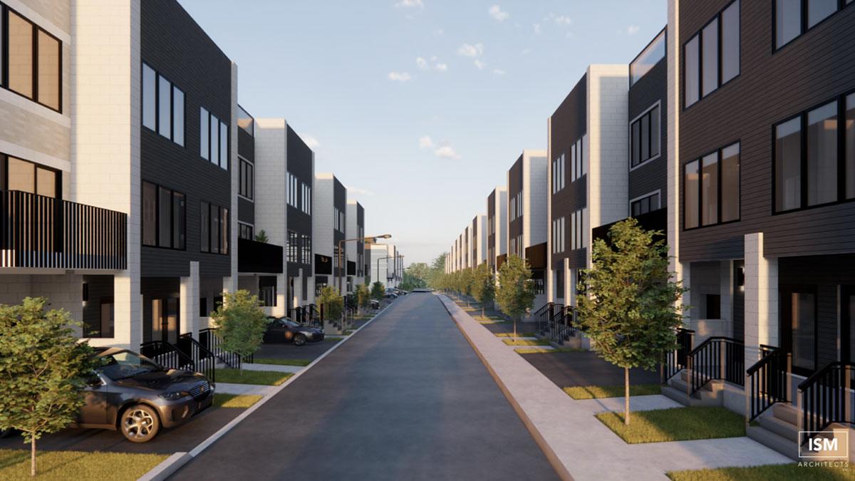 Modern townhouses line a quiet street with trees.