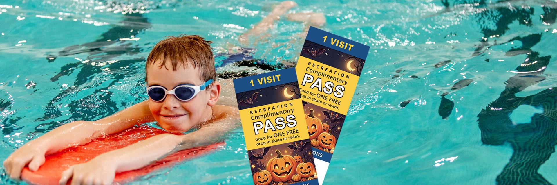 Boy in swim gear smiles while floating in a pool and two Halloween-themed passes nearby.
