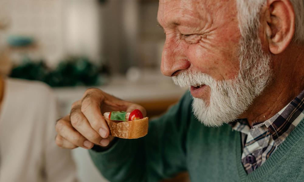Man eating appetizer