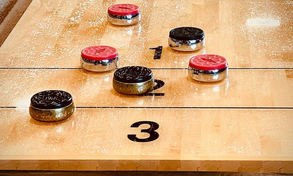 Shuffleboard discs on board