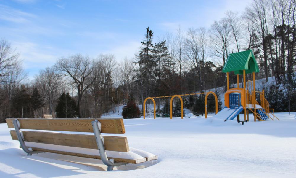 Playground and bench at Little Lake Park