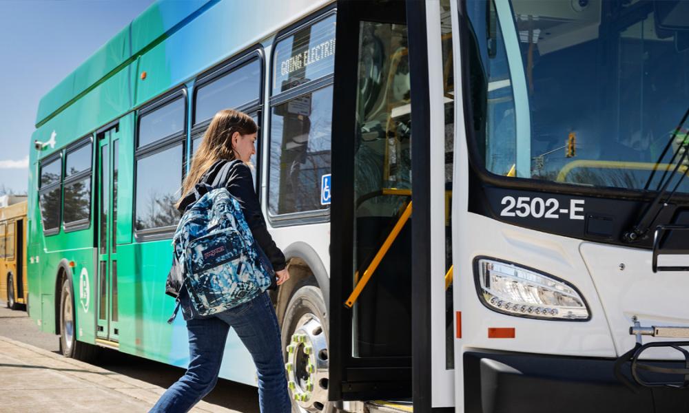 Youth boarding a Barrie Transit bus