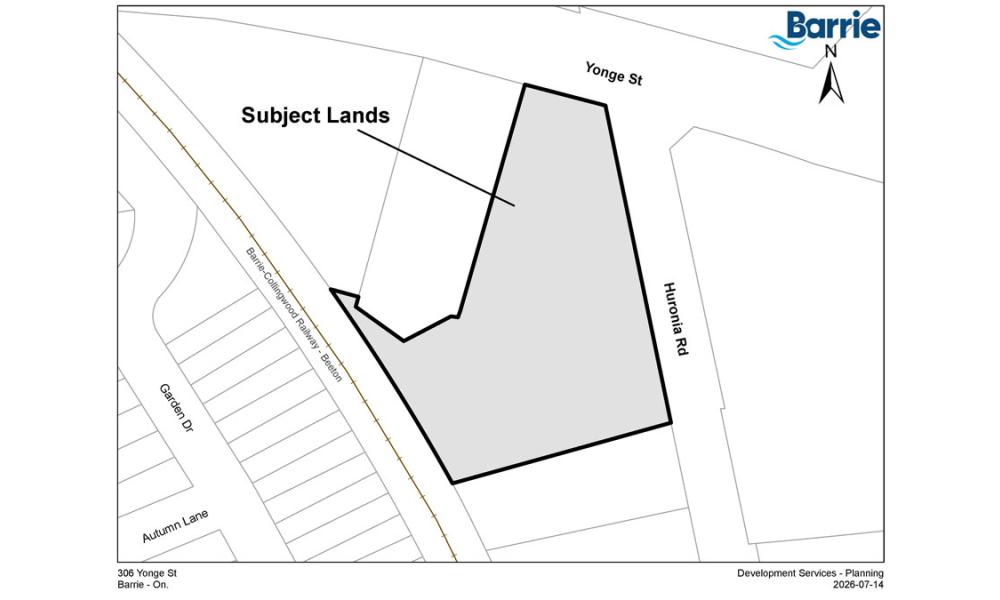 Map showing outlined subject land area with labeled streets and surrounding features.
